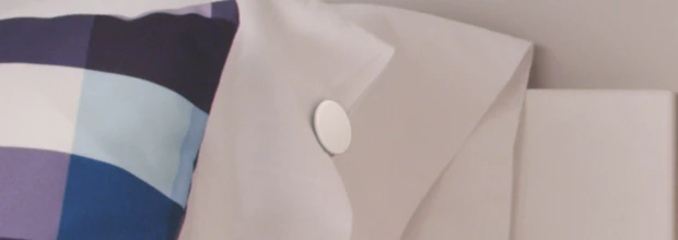 A button-like device called the Sleep Pill is attached to your pillow and uses a 6-axis accelerometer and gyroscope to monitor movement during the night