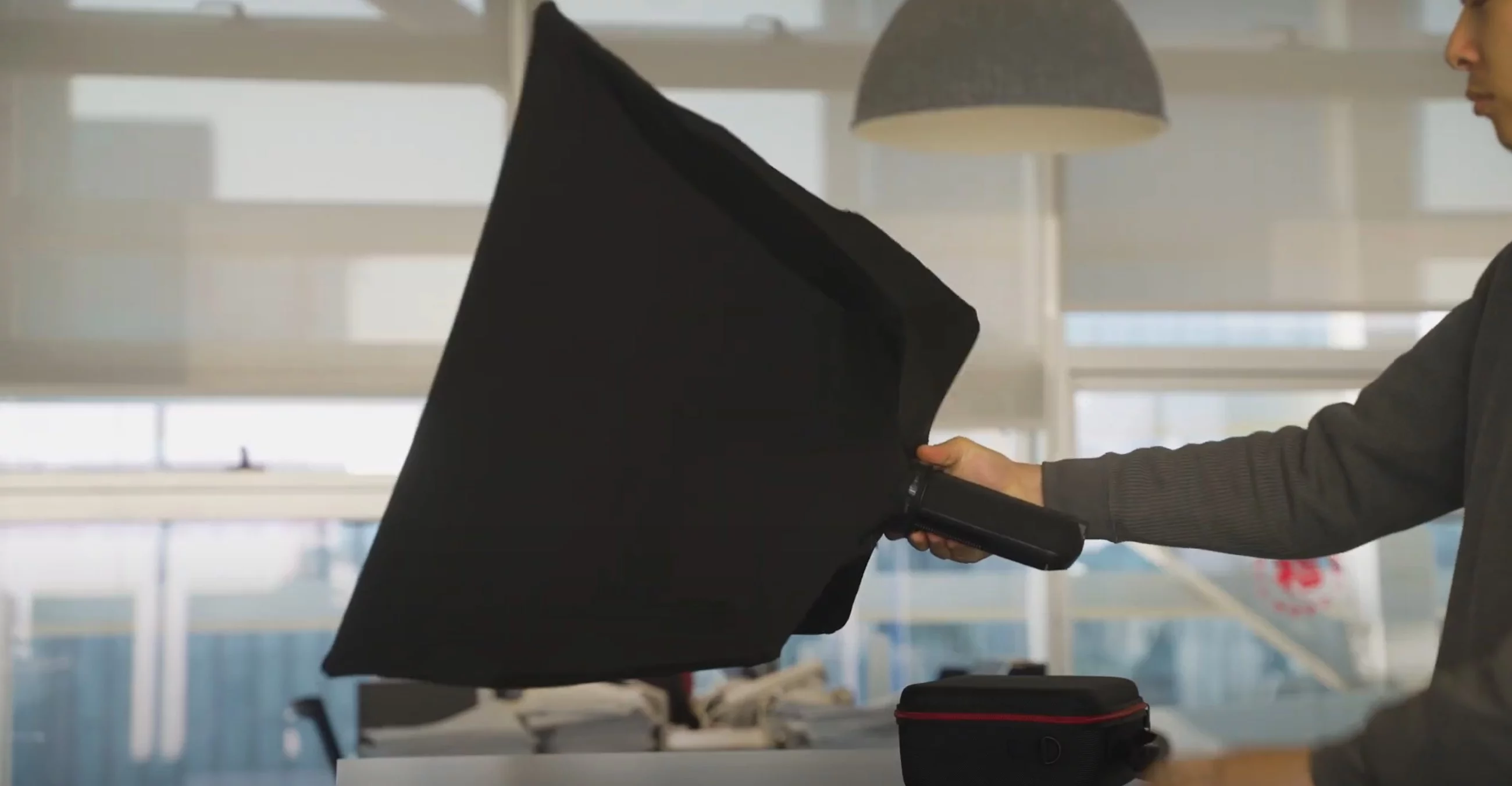 When collapsed, the Splay Max's battery-powered rear projection unit sits within the frame - and is pulled out to unfurl the display