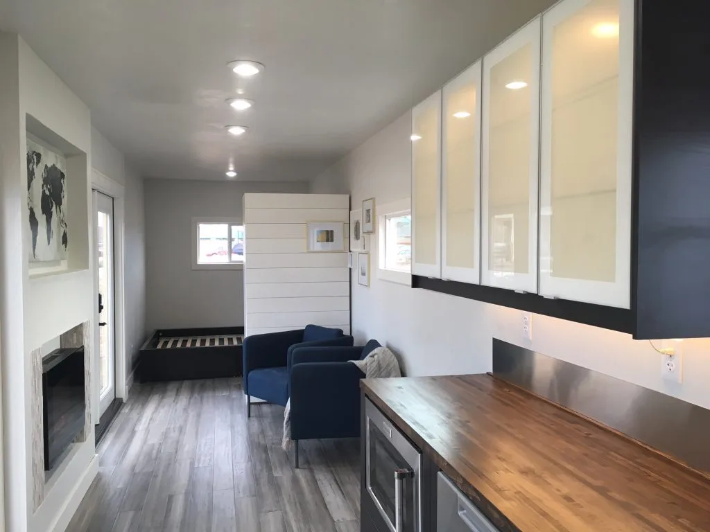 View towards the Intellectual Tiny Home's lounge and bedroom from the kitchen