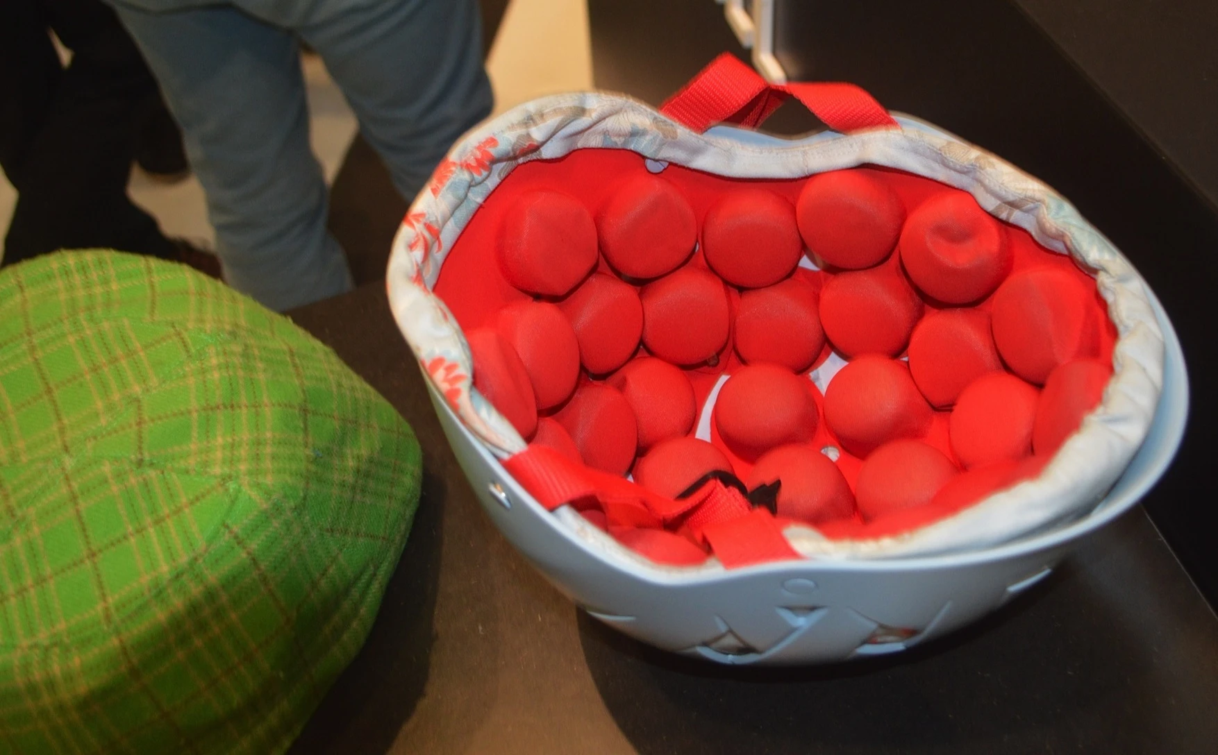 The Vaco12 tech uses bead-filled pods to dissipate impact forces