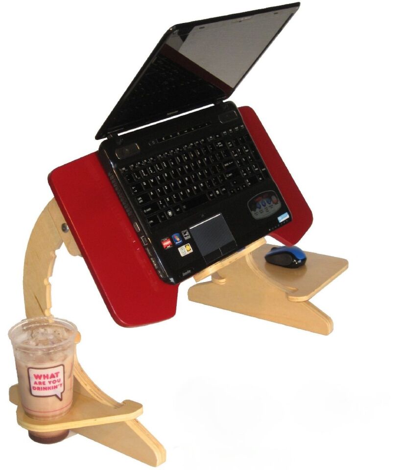 Side platforms provide space for a beverage and peripherals such as a mouse