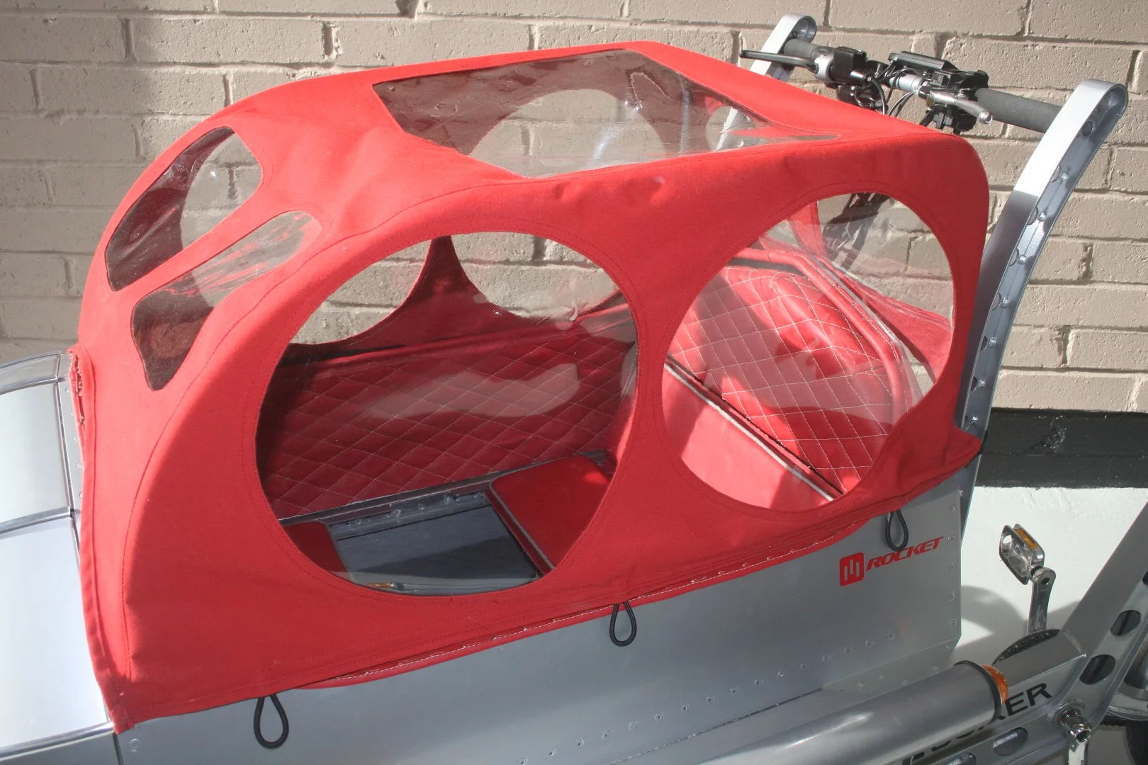 Rocket with deployed rain cover