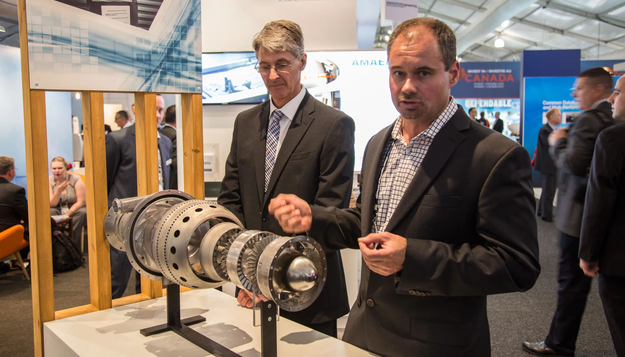 Monash University's Dr David Lyster (left) and Managing Director of Amaero, Simon Marriott with the 3D printed proof of concept engine