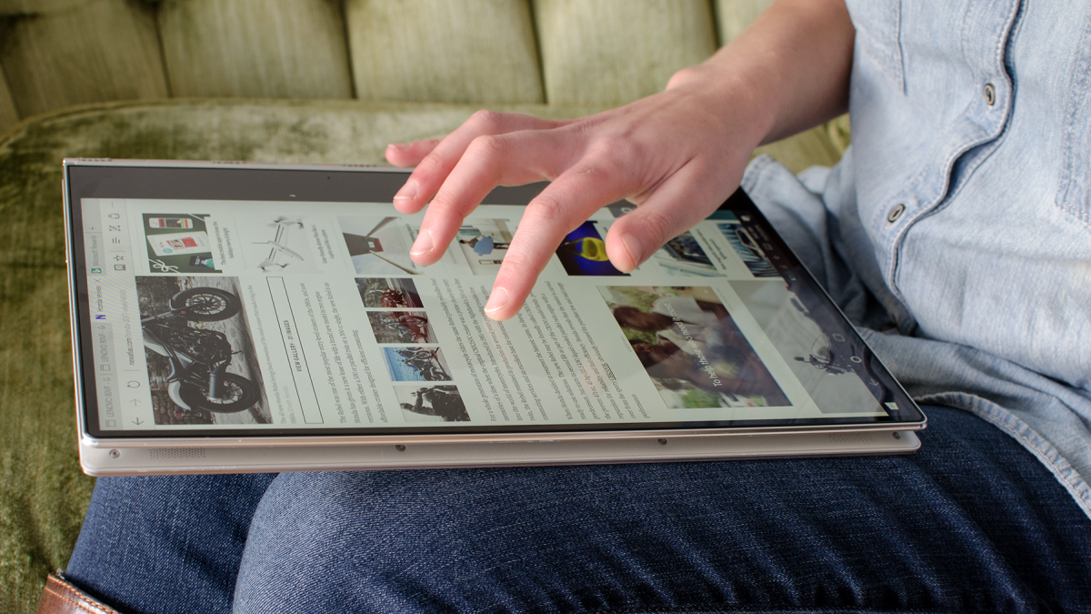 With the keyboard folded behind it, the Yoga 910 becomes its most tablet-like