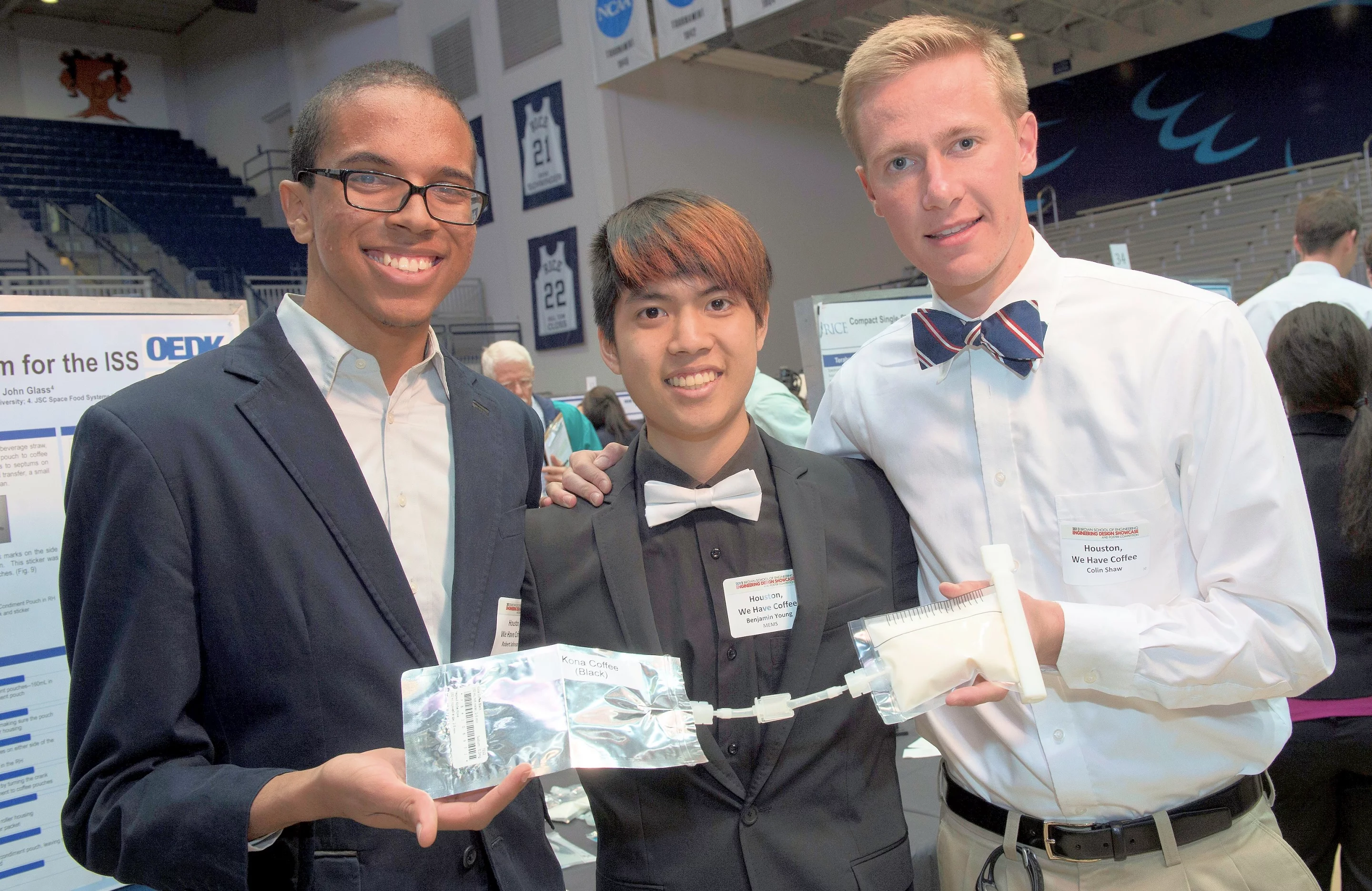 Rice University students, from left, Robert Johnson, Benjamin Young and Colin Shaw show their coffee as you like it for astronauts aboard the International Space Station