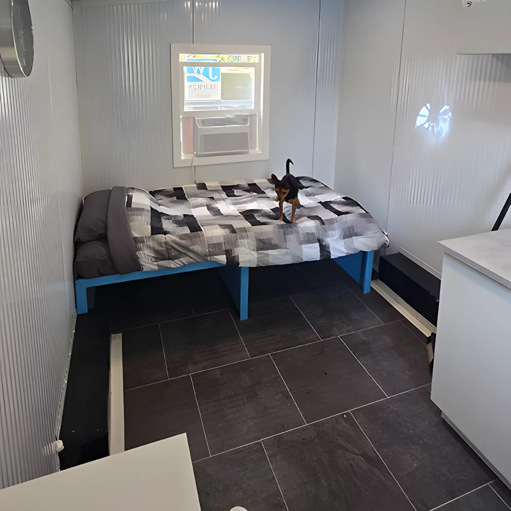 The larger tiny house looks much more roomy inside