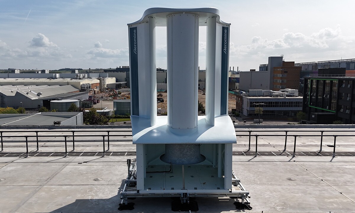 A low pressure zone behind the turbine pulls air through the bottom to power a generator
