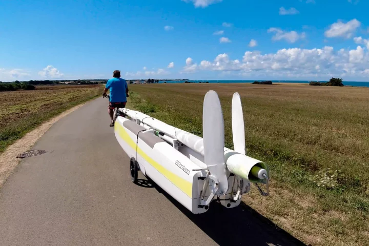 The IZIBoat can be collapsed down in 15 minutes and towed by ebike