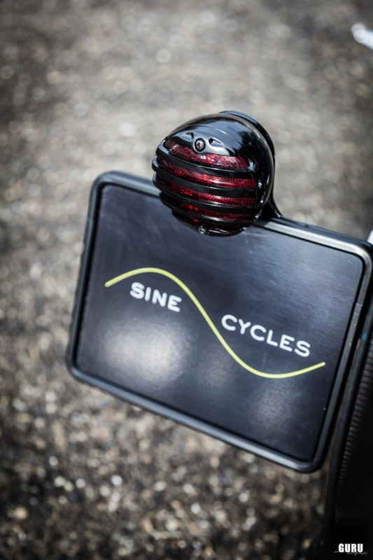 A Louis LED rear light is combined with a license plate holder that was custom-made by Sine Cycles
