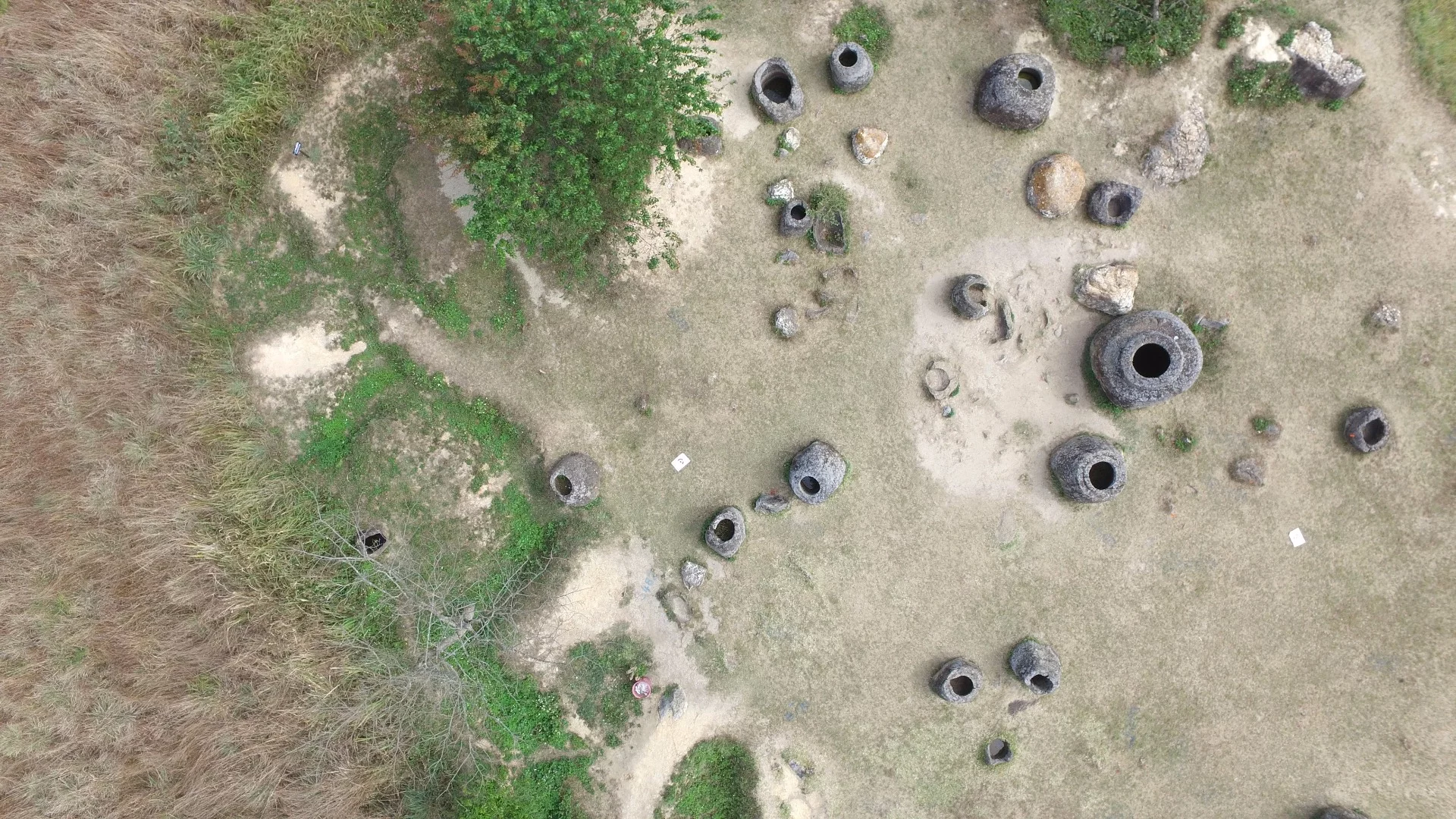 The Plain of Jars stretches over hundreds of square kilometers of green and hilly countryside around the town of Phonsavan, Laos