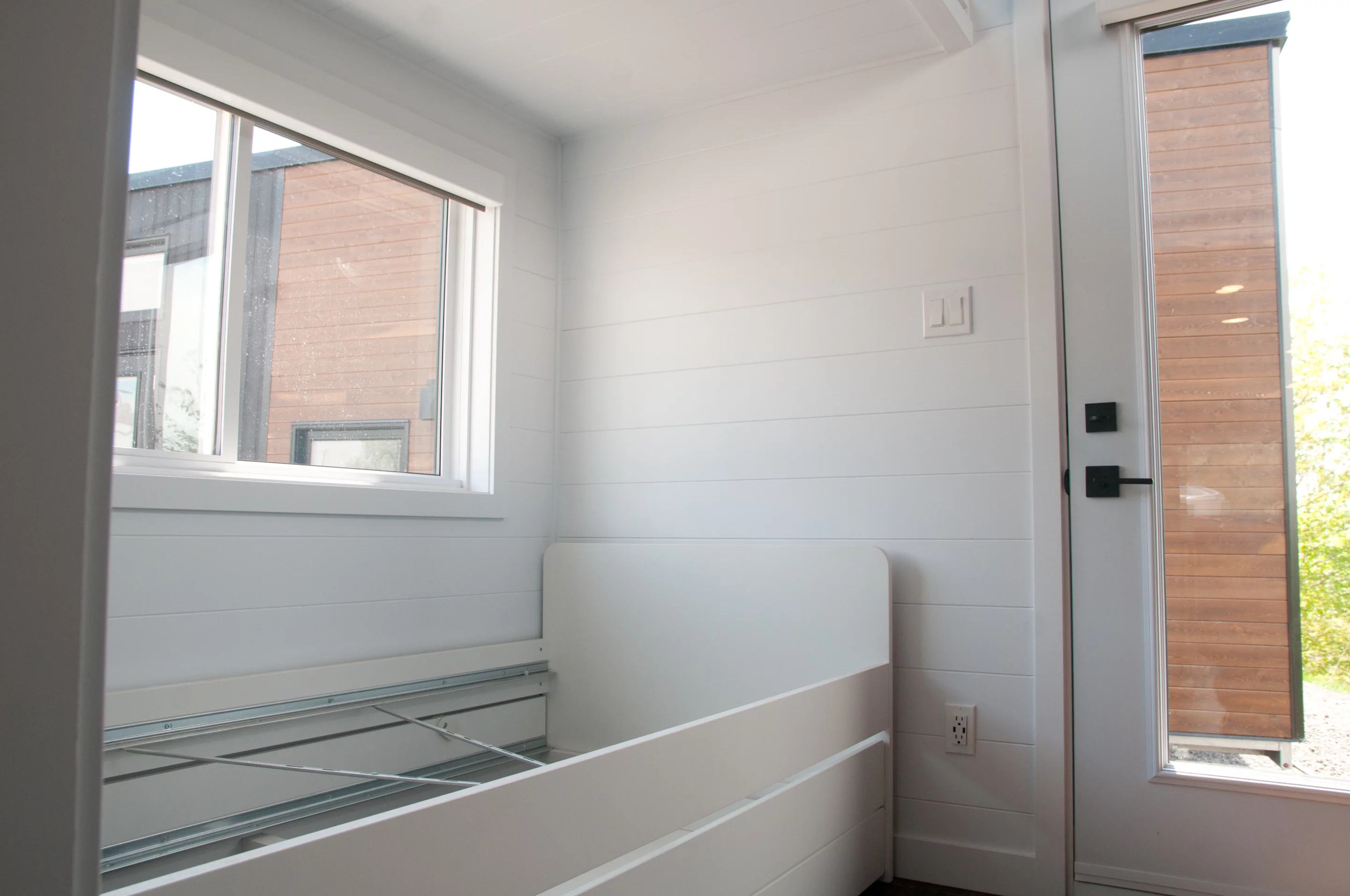 The Noyer XL V2's secondary entrance offers direct access to the master bedroom downstairs