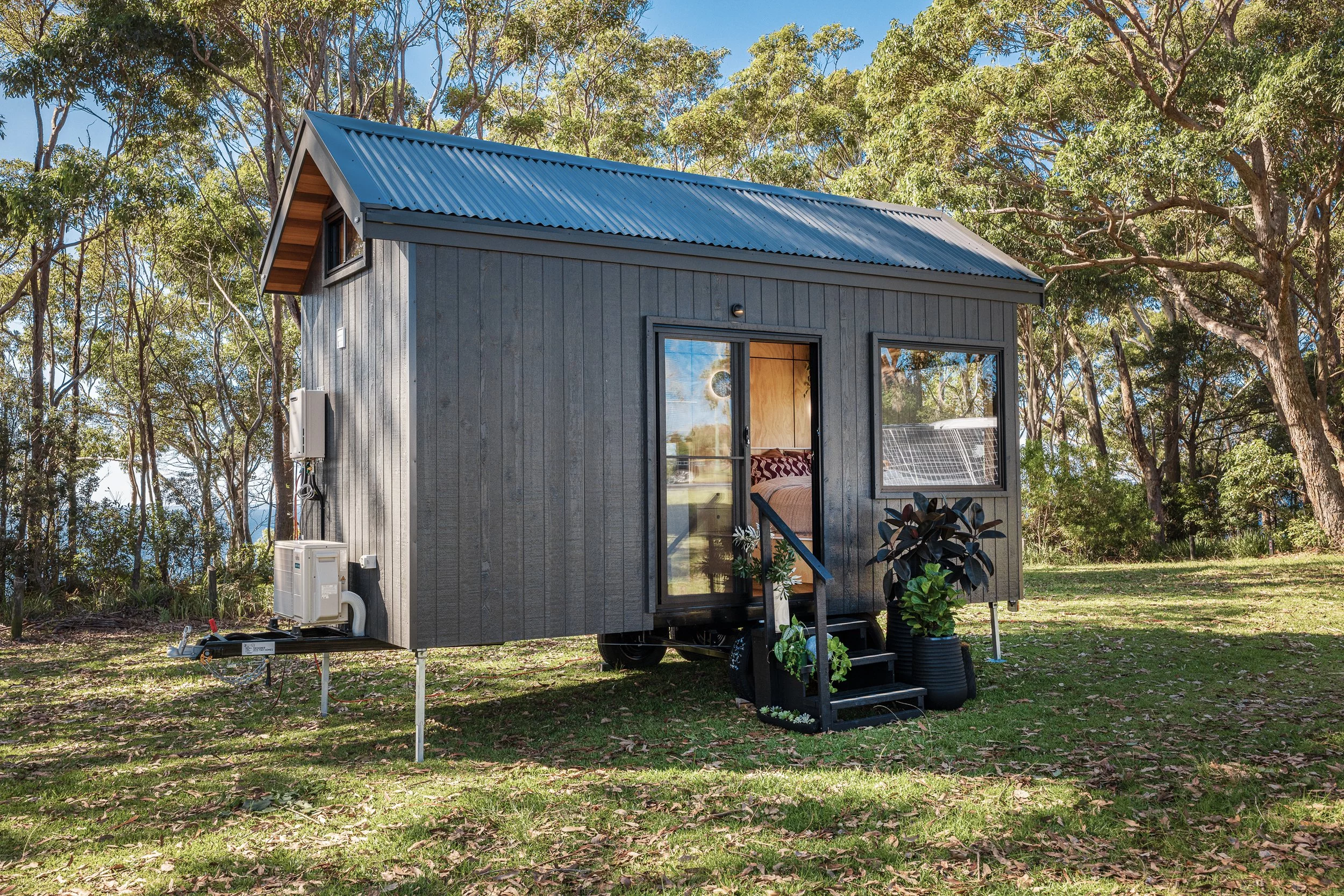 The Five Four is a compact tiny house with a length of just 5.4 m (17.8 ft) yet sleeps up to four people