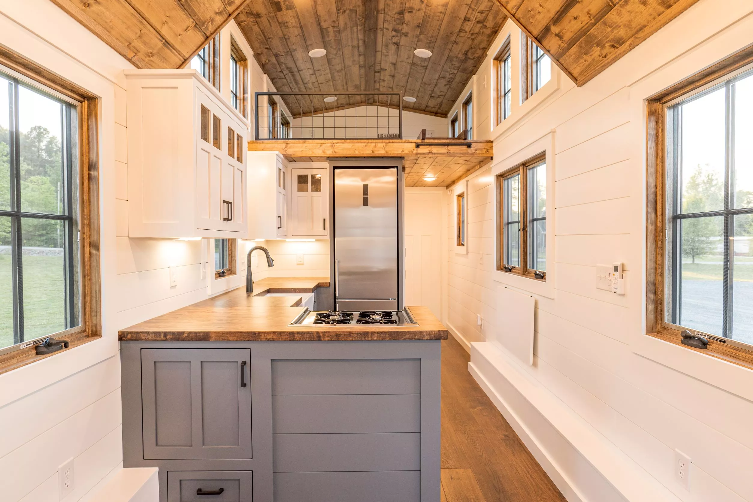 The Teton's interior is finished in shiplap walls and stained wood ceilings, with hardwood floors
