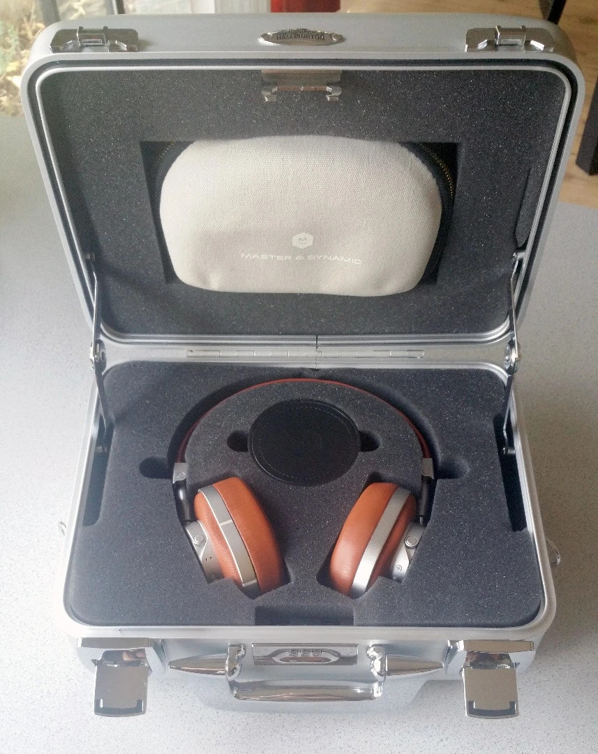 The Master & Dynamic MW60 headphones tuck safely within the Zero Halliburton case's foam inserts, with space for the leather cable box and canvas carrying case