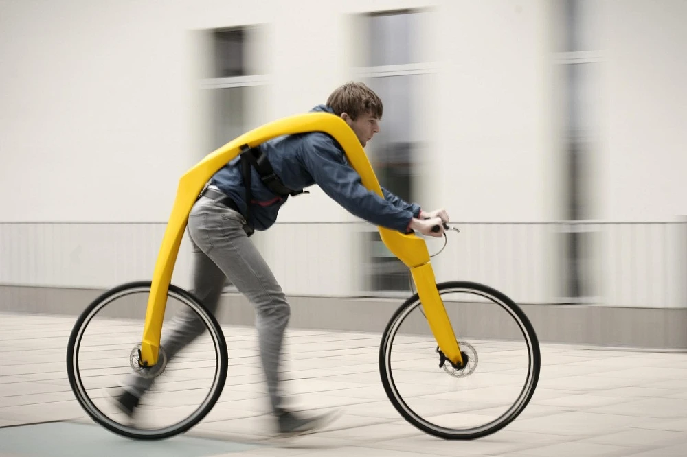 Even in a still picture, the scooting motion required to ride the Fliz is apparent