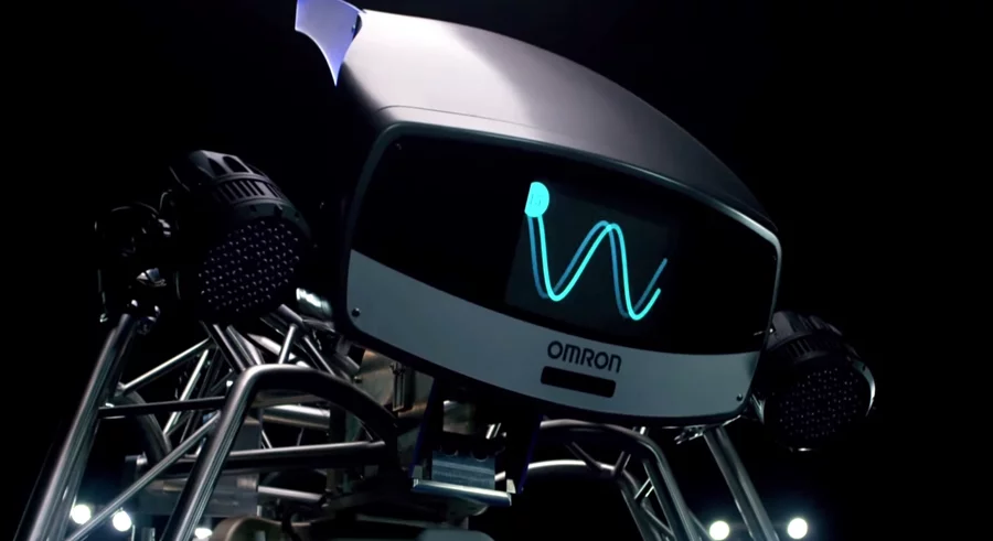 The robot monitors the position of the ball, the position of the human opponent and the position of the opponent's bat before calculating the ball's likely trajectory and velocity