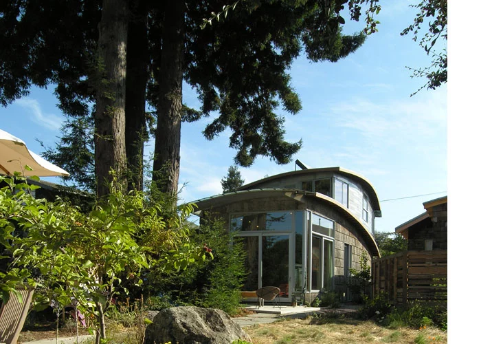 The upper outside walls of the McGee house are made from over 100 salvaged car roofs