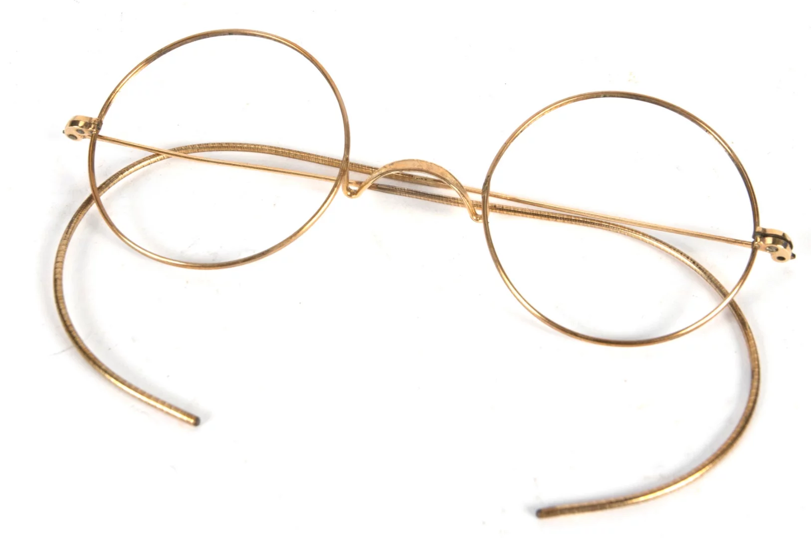 John Lennon's gold wire rim glasses: Lot 560, estimate $20,000 - $30,000