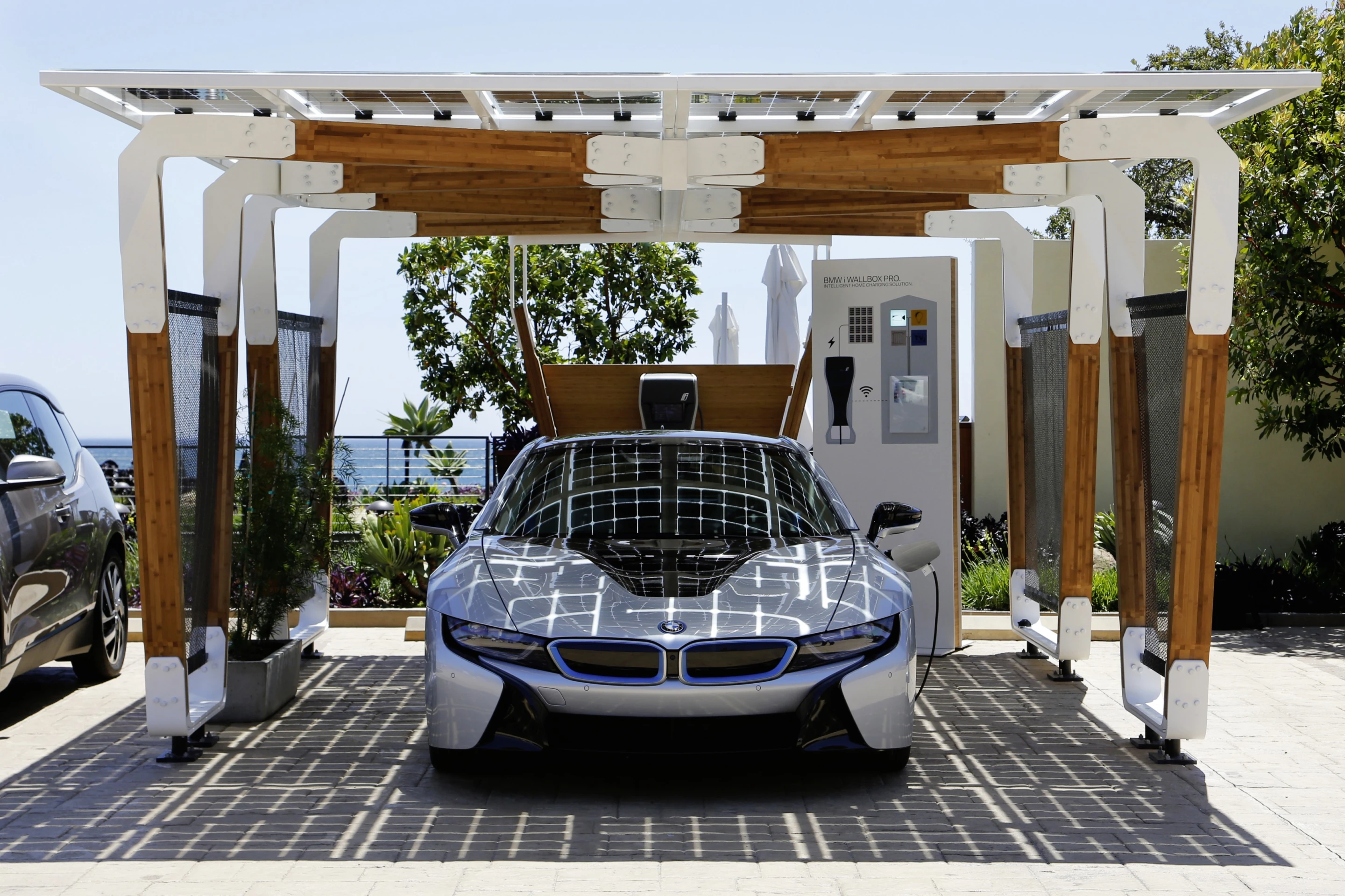 The solar carport, designed to work in partner with BMW’s I Wallbox Pro, enables owners to charge direct from the solar collector panels
