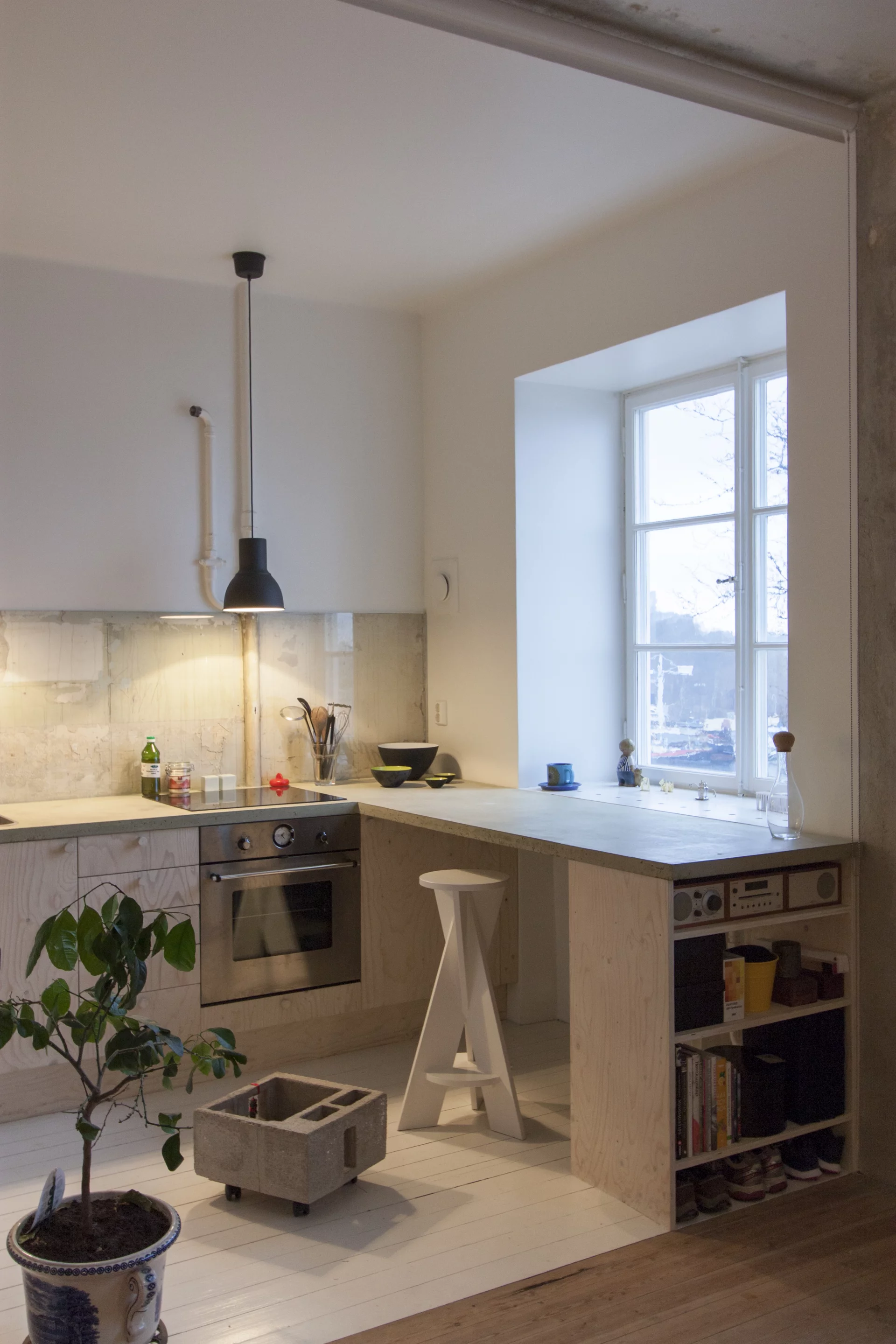 The unit hosts three sections: the kitchen