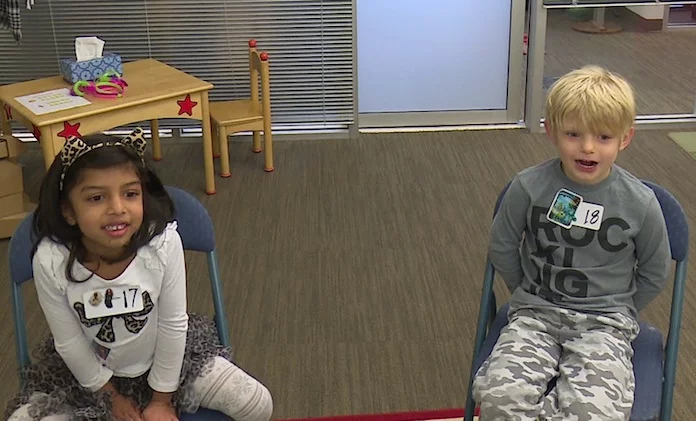 Two of the kids controlling Mole Madness with their voices