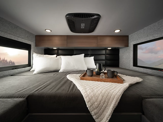 The initial Entegra Embark floor plan includes a roomy rear bedroom with extra-long king-width bed