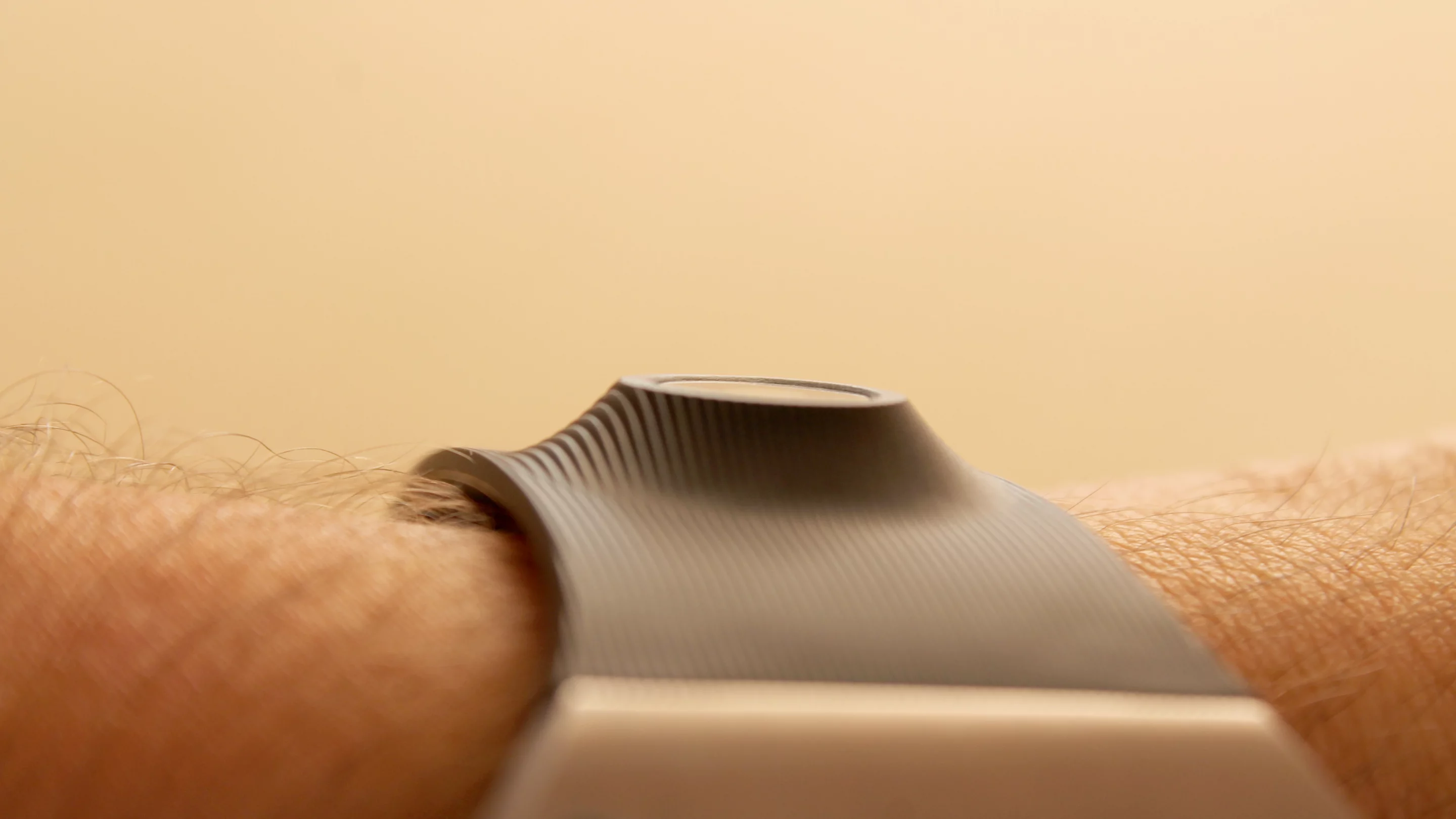 The Gear's camera slightly protrudes from the watch band