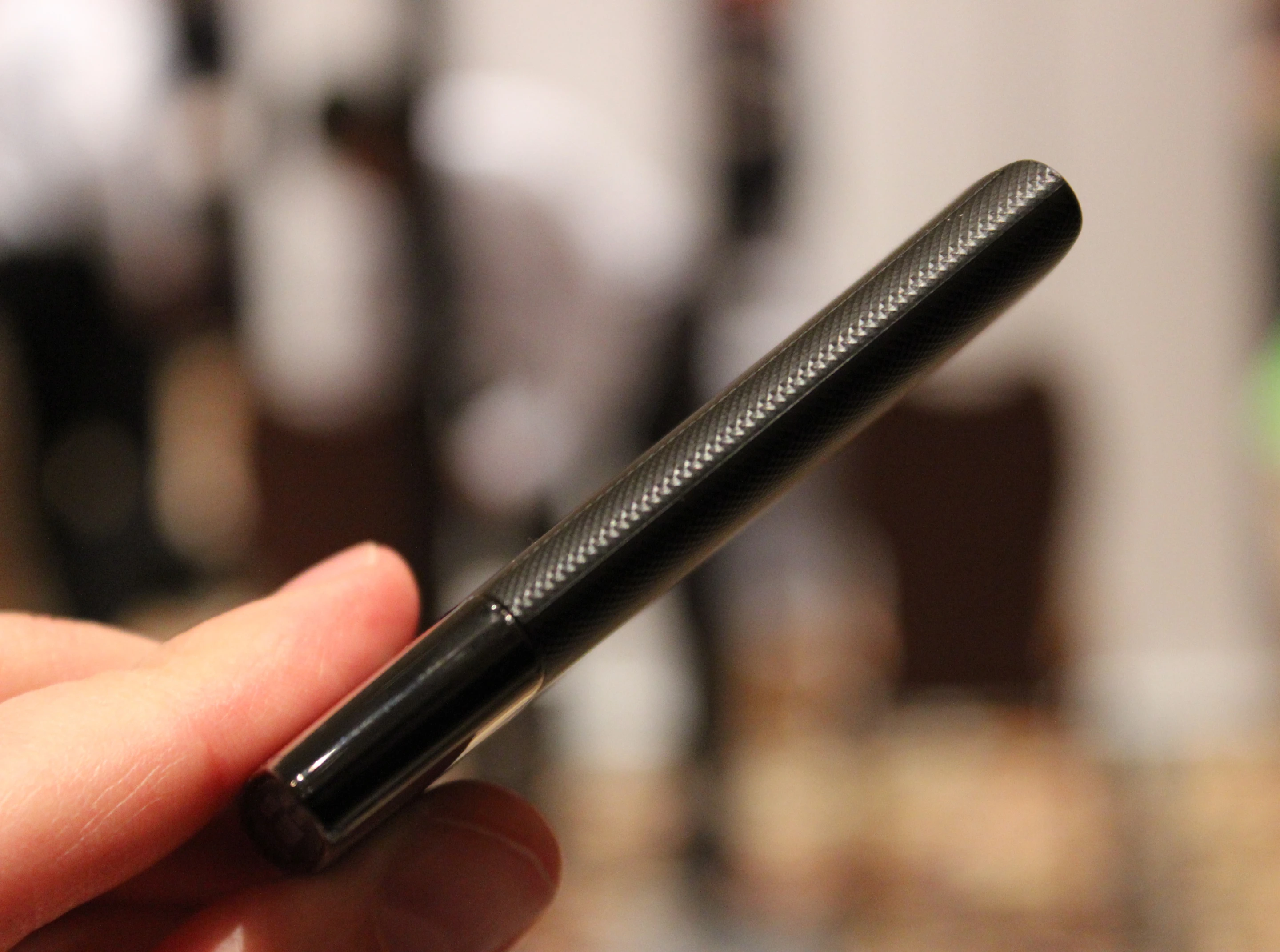 The unit felt very small and thin when Gizmag had some hands-on time with it at Samsung's CES booth (Photo: Will Shanklin/Gizmag.com)