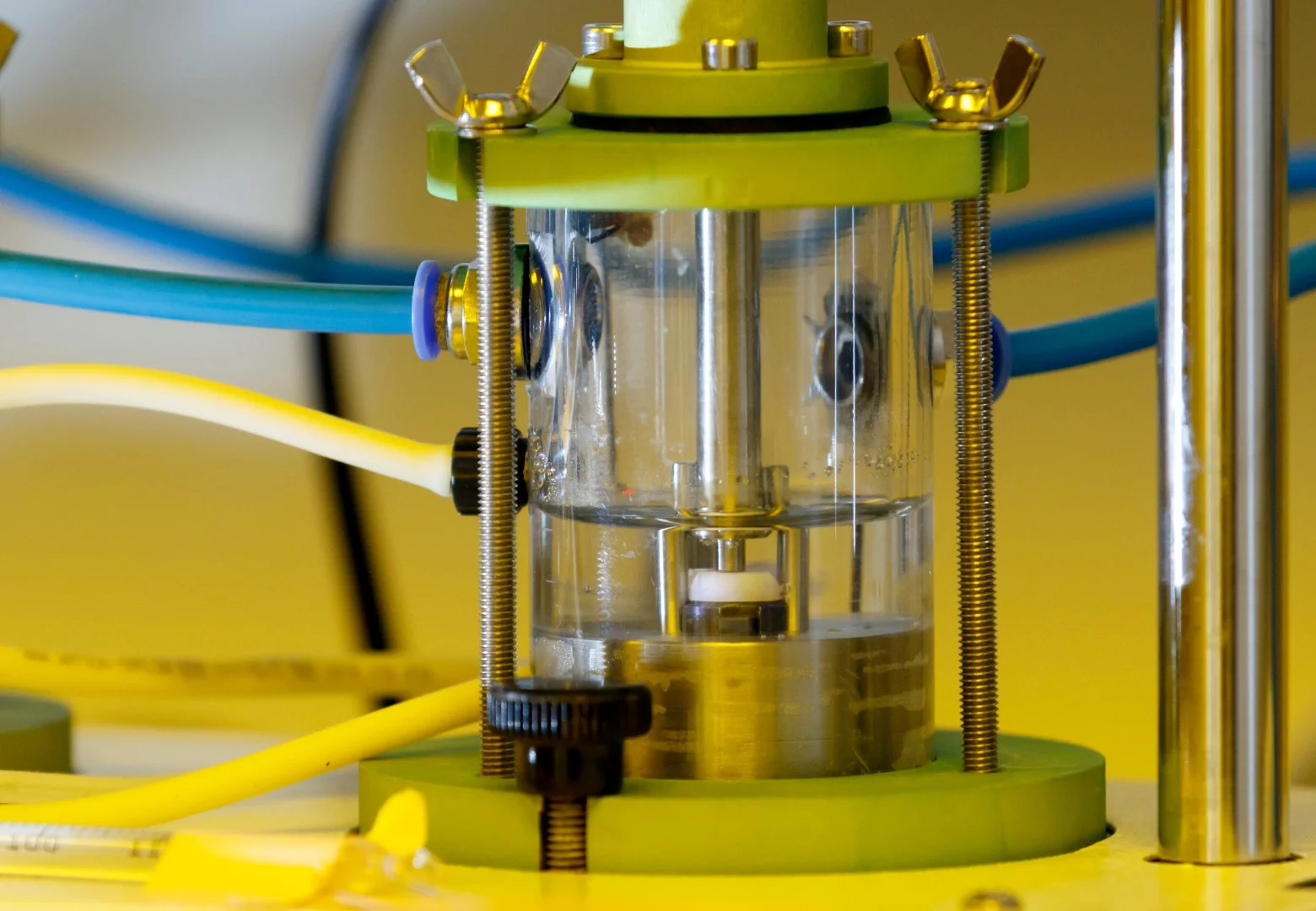 A bioreactor is used to simulate an oral environment, in which a slice of tooth has been placed