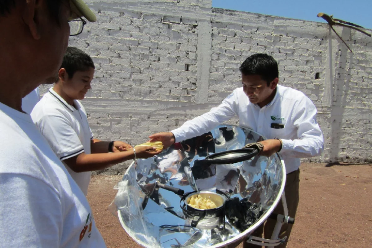 The team's solar stove, made up of a central container coated in a soot paste to increase solar heat absorption
