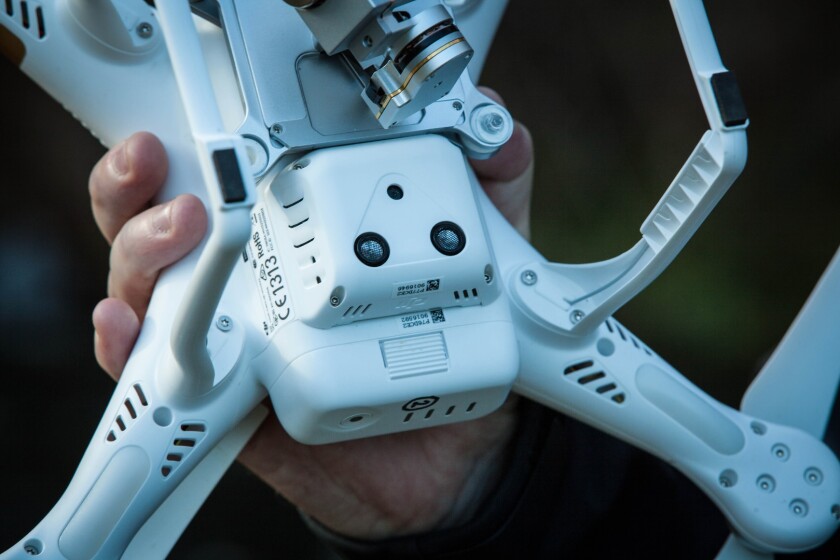 DJI's Phantom 3 Professional - downward facing camera and ultrasound sensors combine with improved GPS and added GLONASS system to give much more stable flight inside, outside and in strong winds