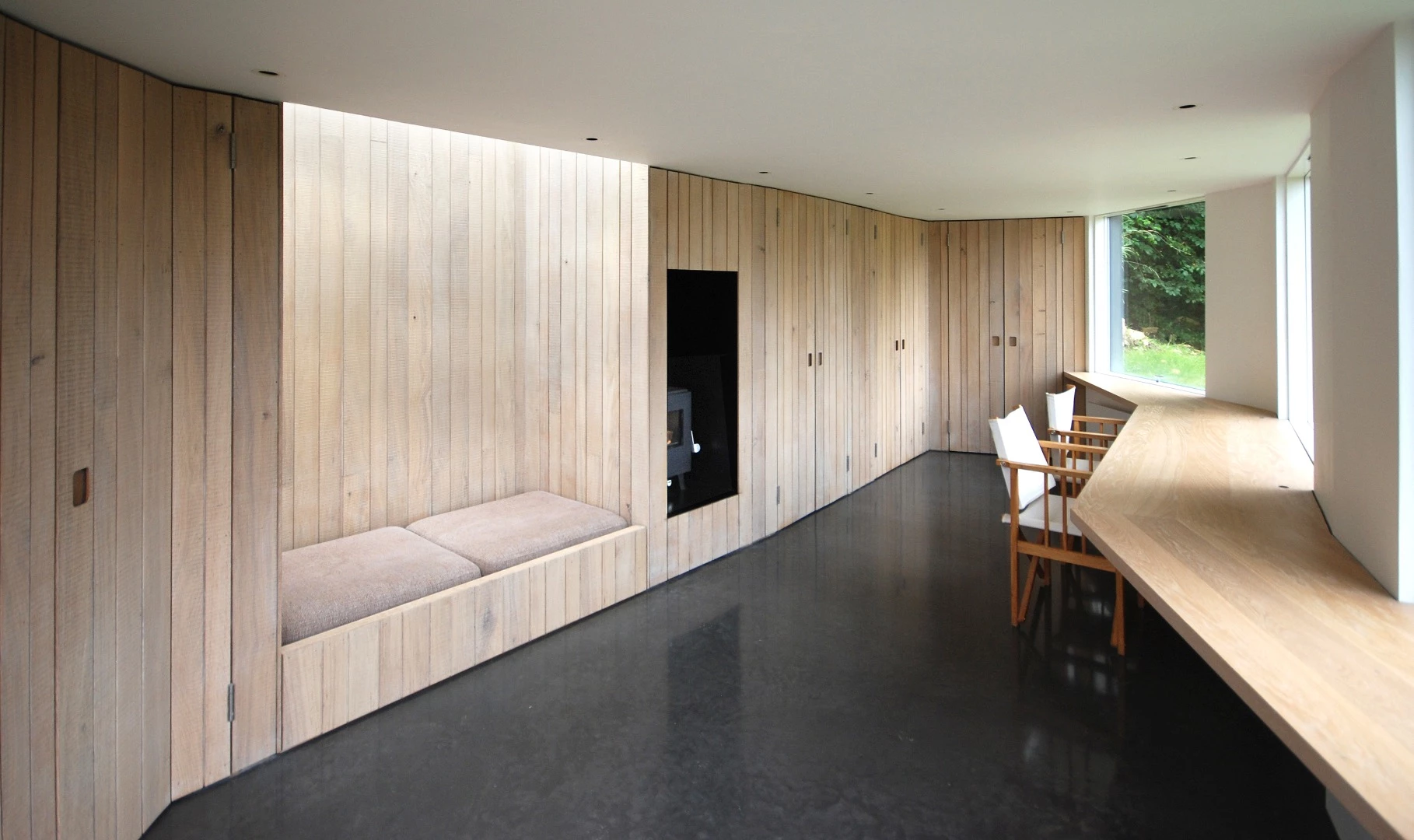 Myrtle Cottage Garden Studio, by Stonewood Design, serves as a space to work, sew, play guitar and sleep