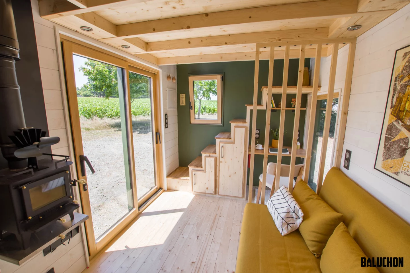 Visitors to the Milanda enter through double glass doors, which really open up the interior of the home to the outside
