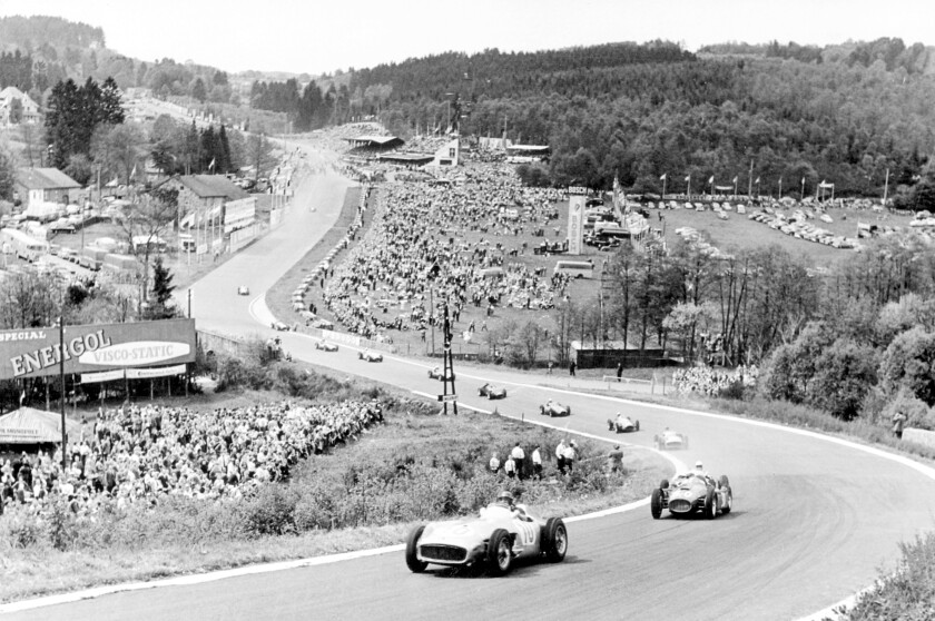 Juan Manuel Fangio leads the pack through Eau Rouge in his Mercedes-Benz W 196 R in 1955 Belgian GP.