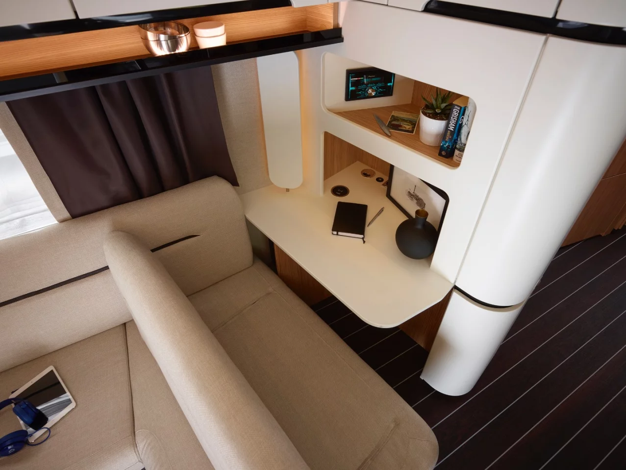 Thanks to this tucked-away desk, occupants can keep their work off the dining area