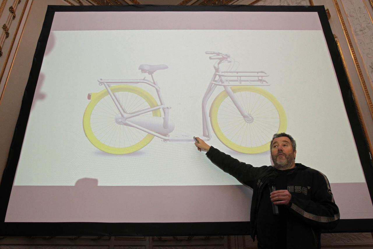 Designer Philippe Starck points to the scooter platform of the new City PIBAL Streamer concept