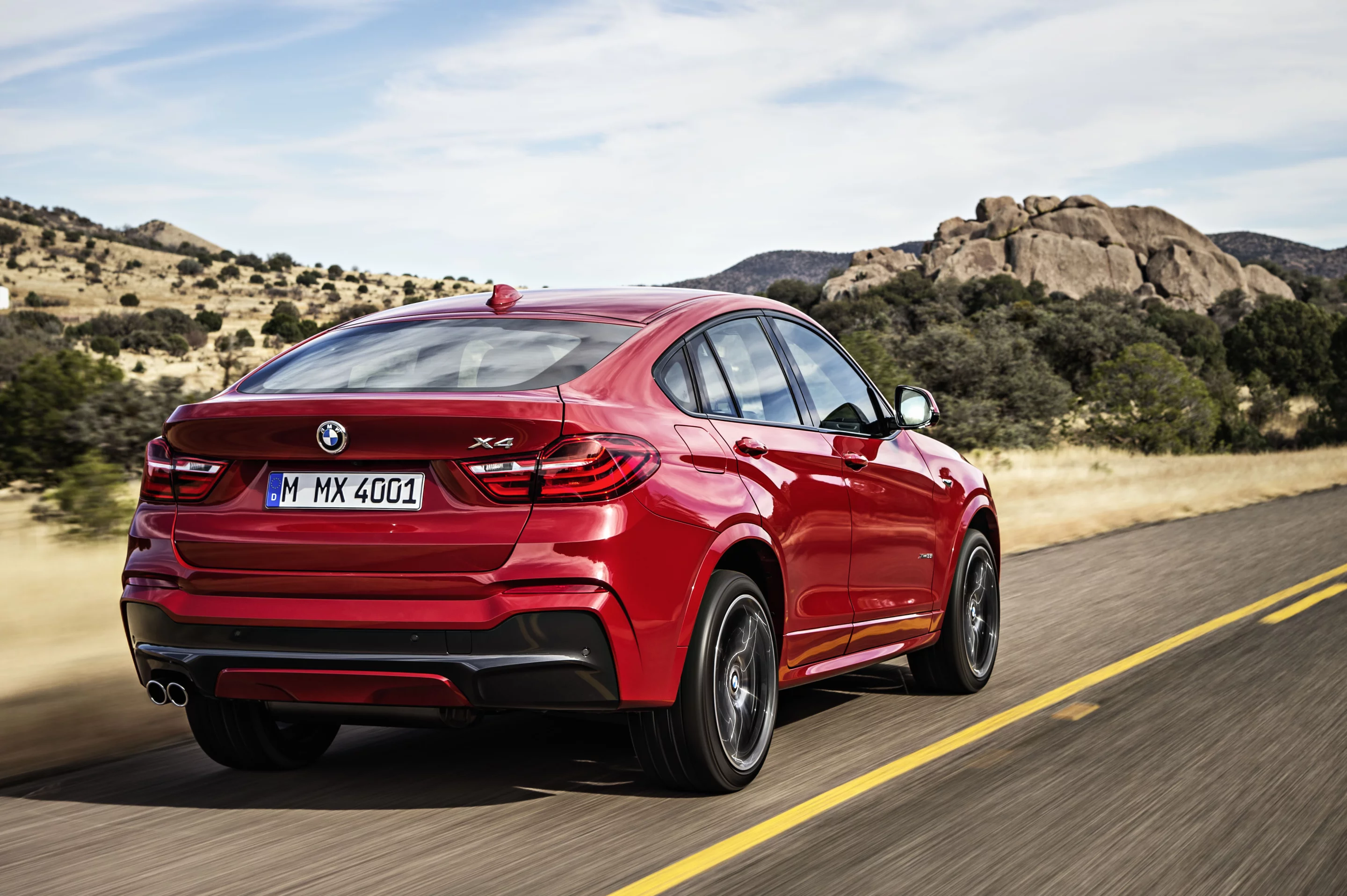 The X4's sloping rear hatch and coupe-like design bear remarkable similarities to the X6