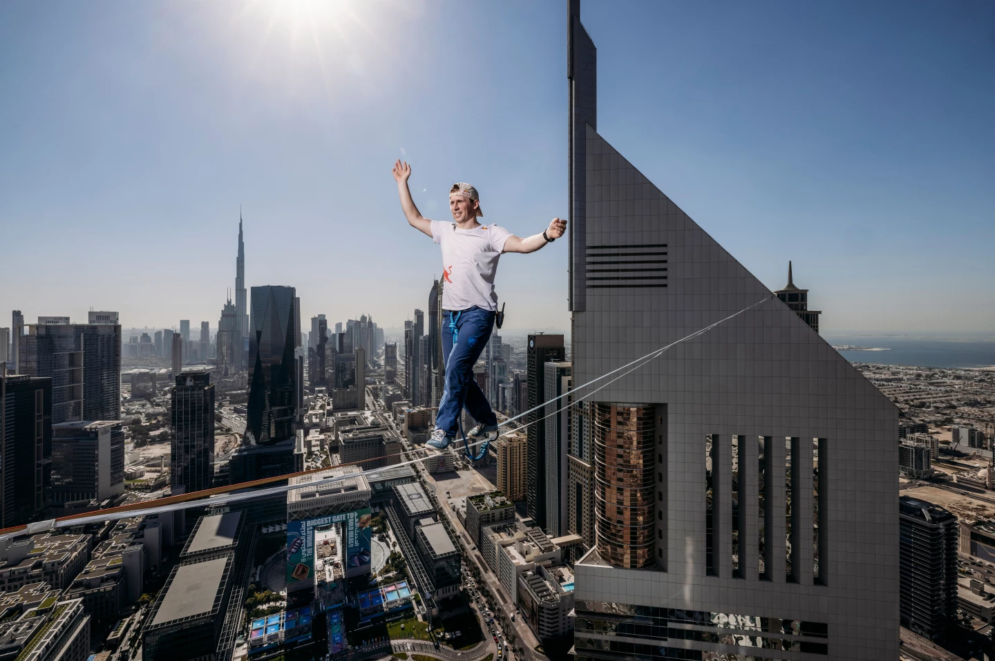 Jaan Roose has successfully walked between two Dubai skyscrapers at a height of 224 m (734 ft) above the city streets