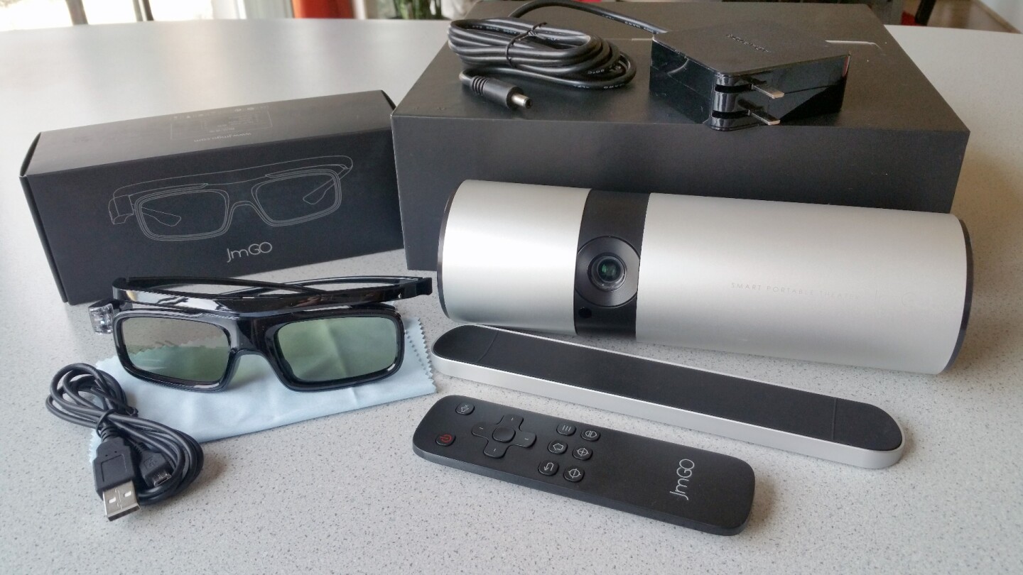 The JmGO View comes with wall adapter, magnetic stand, and remote control