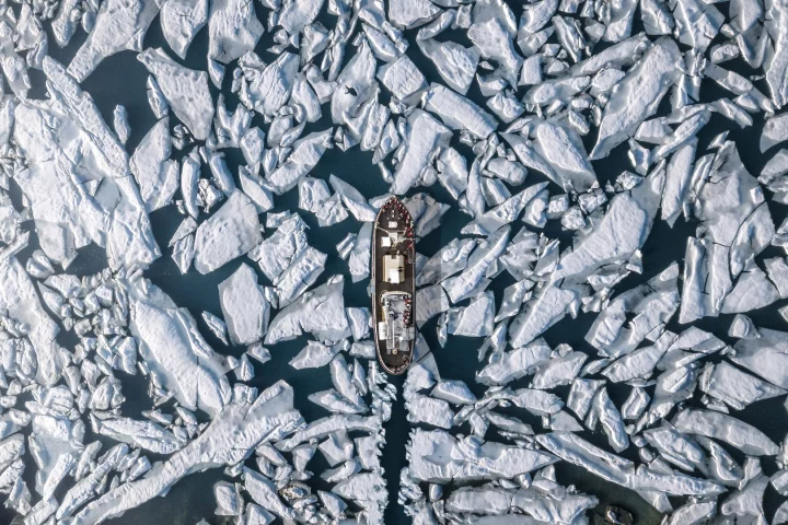 Finalist in The Great Outdoors category of the 2018 EyeEm Awards: A vessel navigates the ice in Hauganes, Iceland