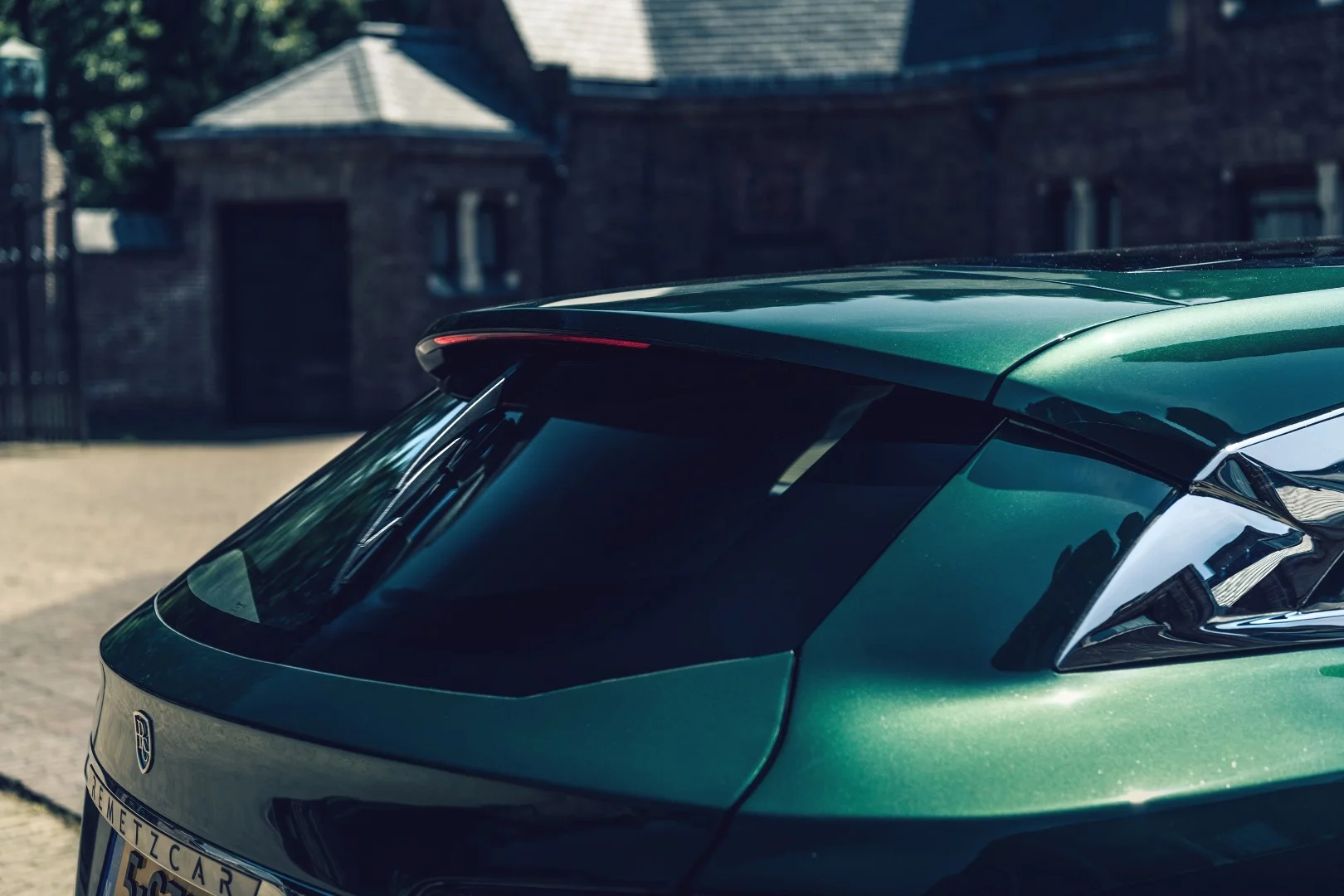 The RemetzCar Model S shooting brake's completely new tailgate, with rear spoiler, hidden wiper and brake light