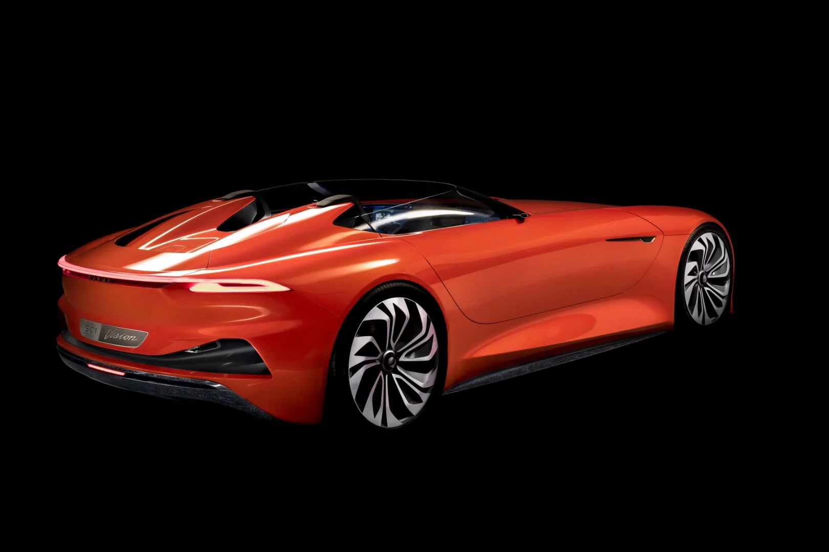The SC1 Vision Concept is the most visually arresting of the Karma Big Three, featuring a low-riding open-air design that almost certainly looks like it's still rushing forward at red-light standstill