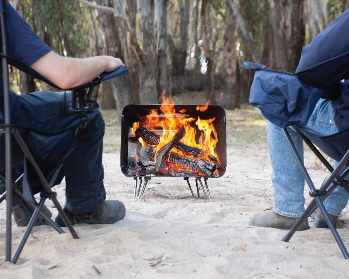 A sort of portable mini-fire place, the Bush Telly puts on a show at camp