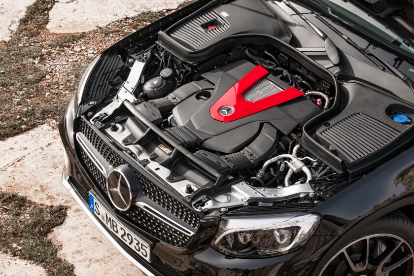 The red aluminum cover on the engine is one giveaway that AMG has paid it a visit