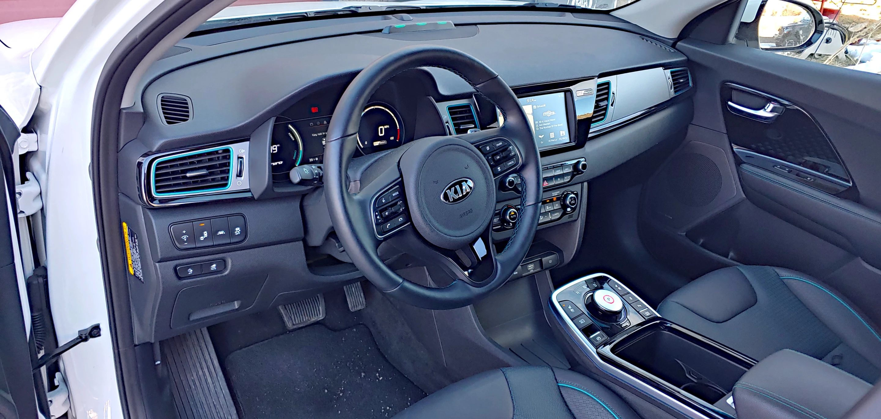 The interior of the Kia Niro EV is not as upscale as its price tag might suggest from the get-go, but it's comfortable and roomy for the car's compact size
