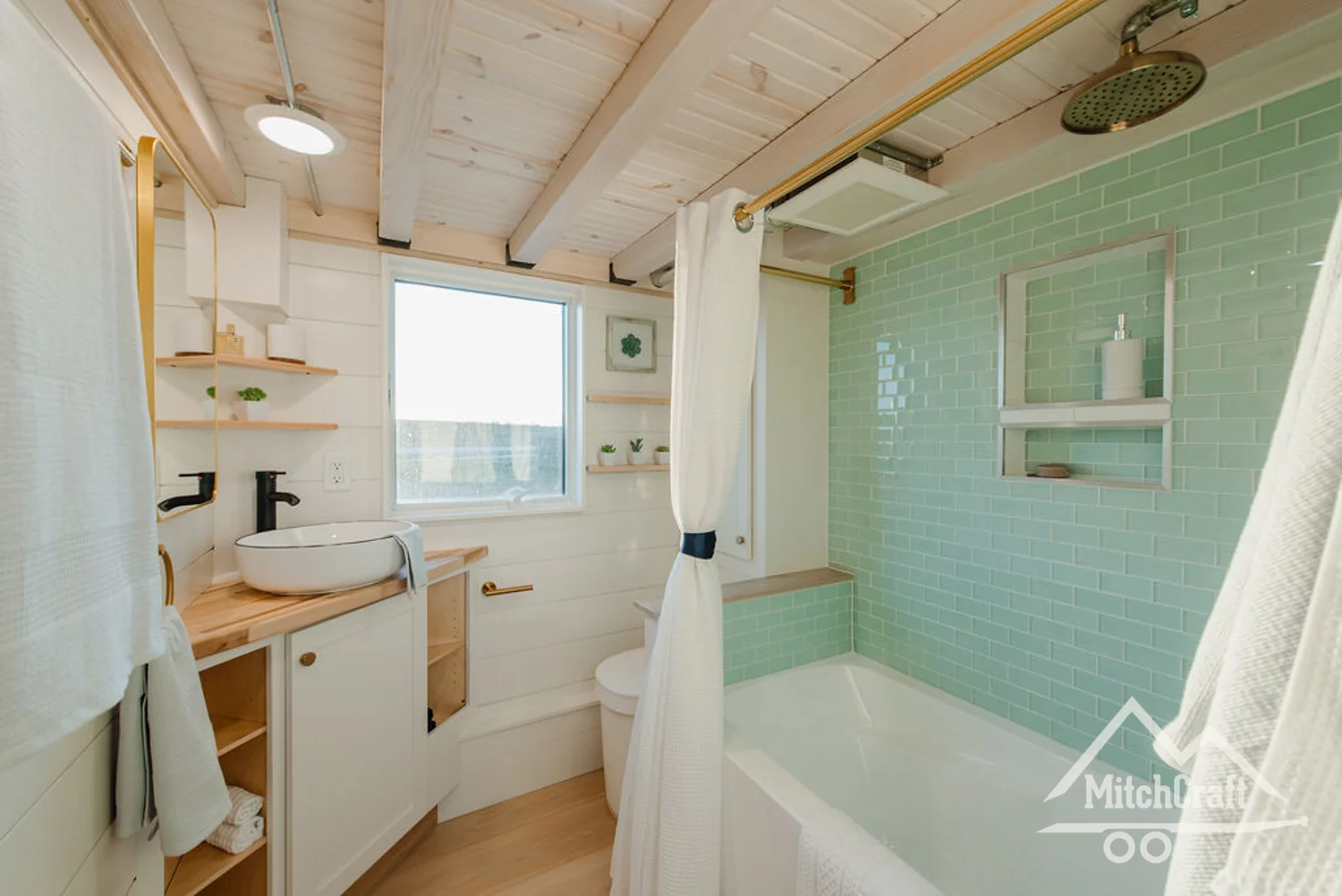 The full-sized bathroom goes big on comfort and style