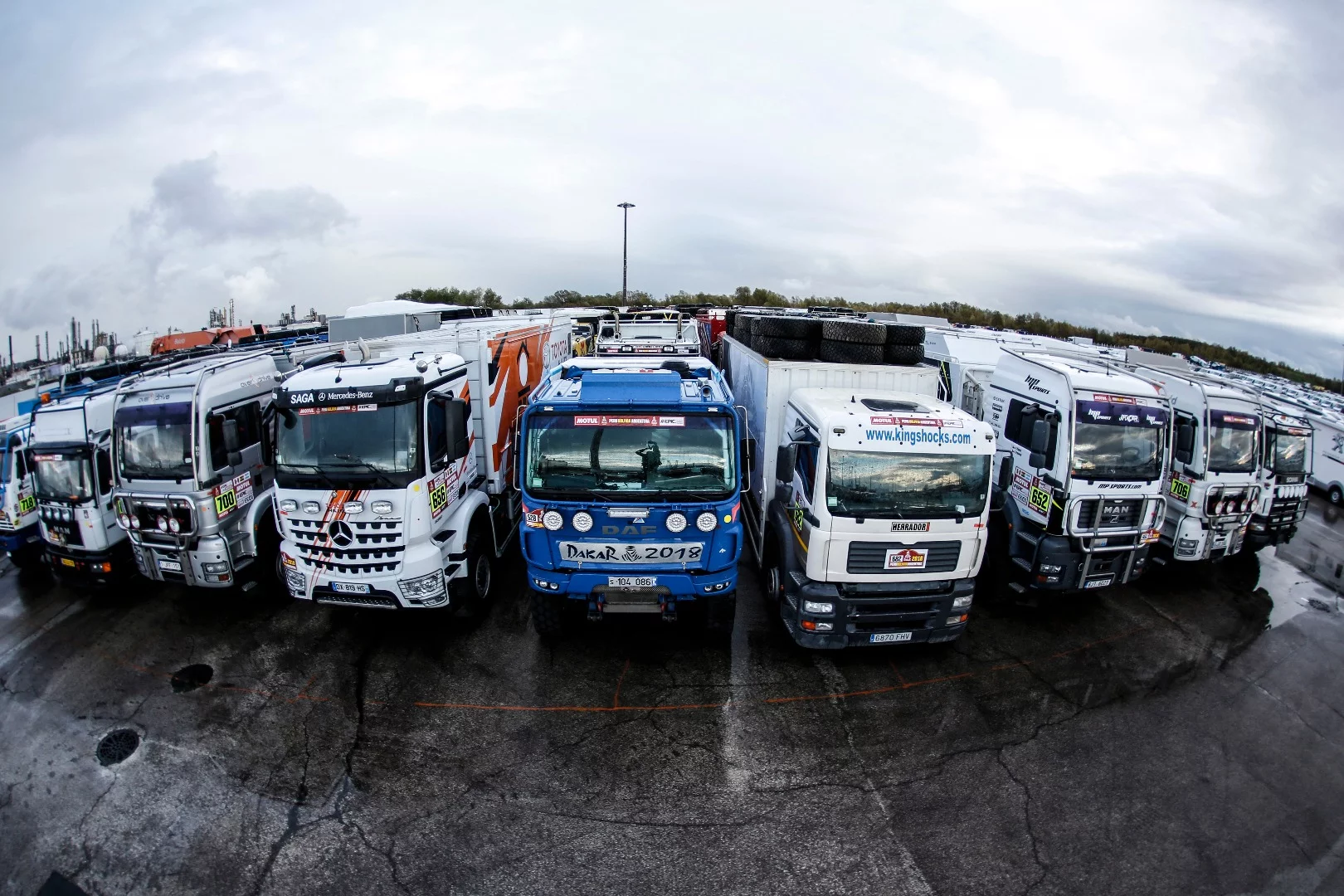 Team trucks at Le Havre, France, waiting to board the boat to Peru