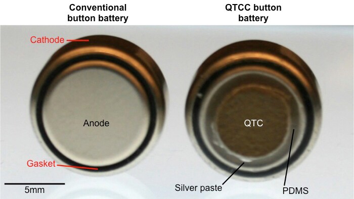 A typical button battery (left) and a button battery coated with quantum tunneling composite (QTC) (Photo: Bryan Laulicht)