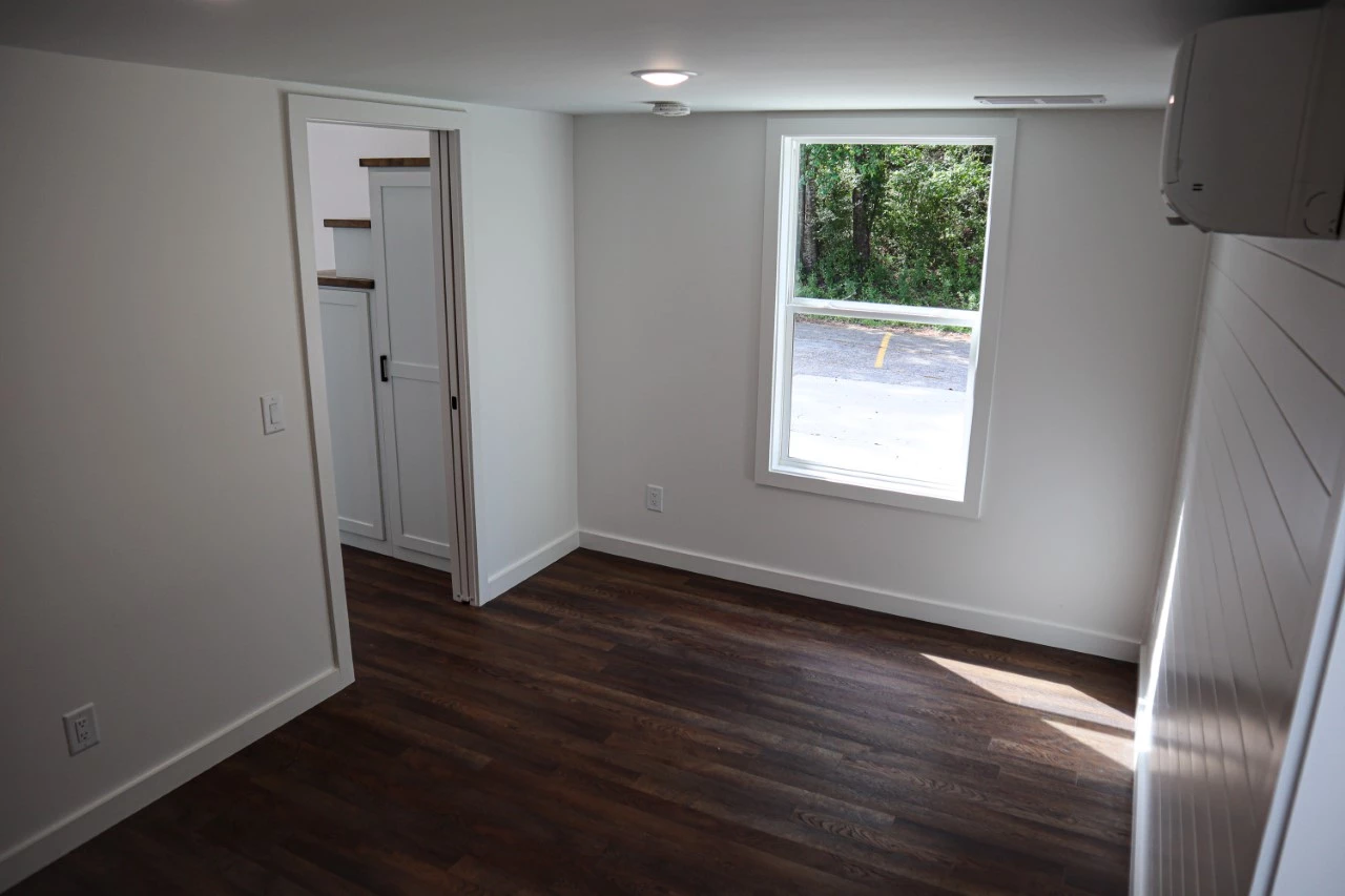 The Dogwood includes two downstairs bedrooms, both of which can optionally feature en-suite bathrooms