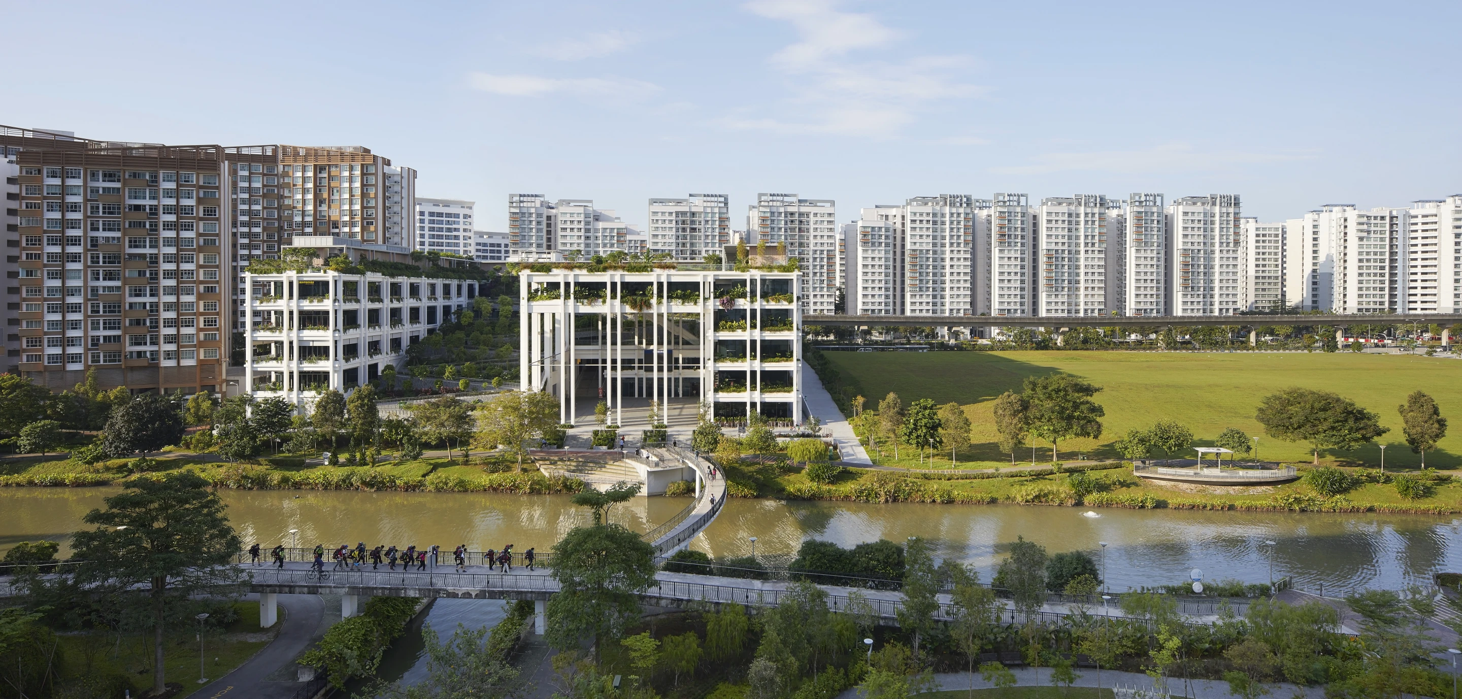 Oasis Terraces takes its place remarkably well among the surrounding buildings in Punggol, Singapore